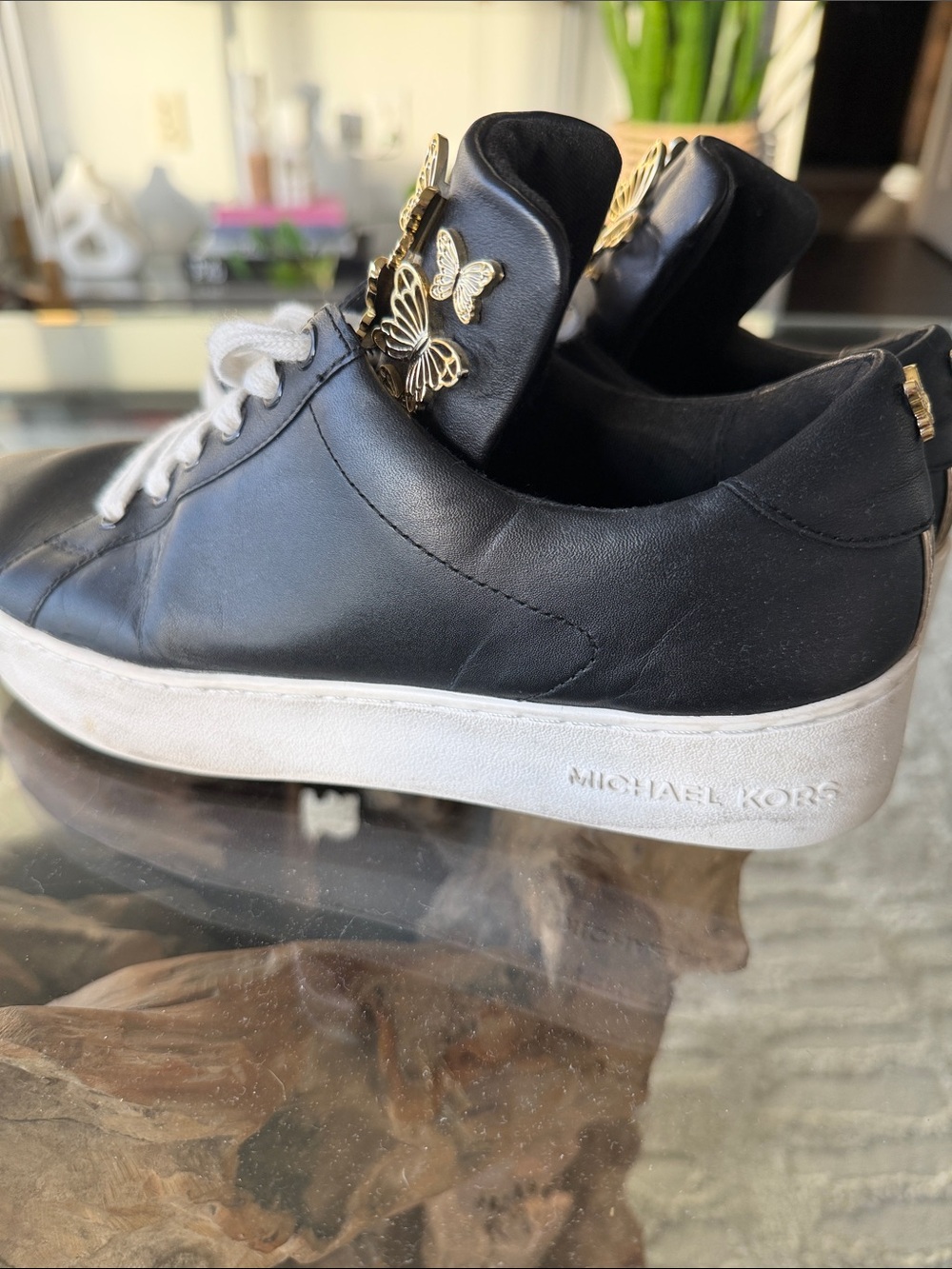 Michael Kors Black High-Top Sneakers with Gold Butterfly Accents - Picture 4 of 4